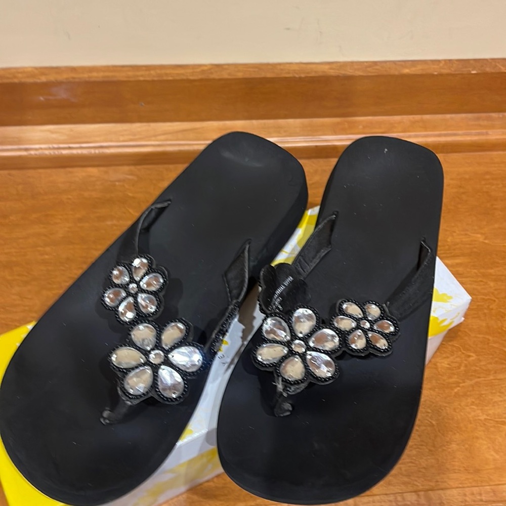 Black flip flops